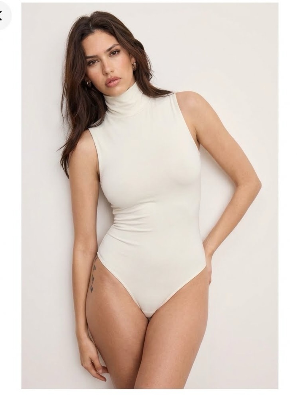 BuffBunny white Sleeveless Turtleneck Bodysuit